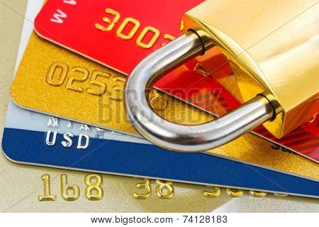 Credit cards and lock, business security background