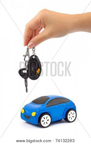 Car and hand with keys isolated on white background