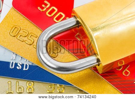 Credit cards and lock - business security background