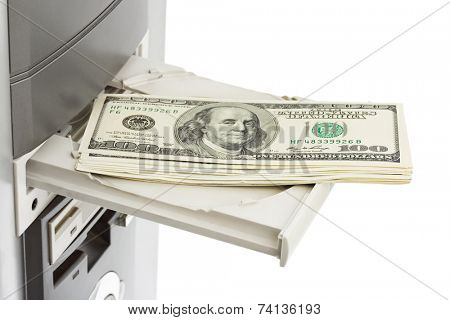 Money and computer isolated on white background
