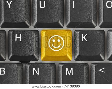 Computer keyboard with smile key - business concept