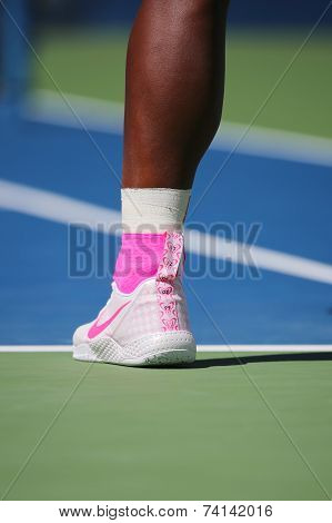 Seventeen times Grand Slam champion Serena Williams wears custom Nike tennis shoes during US Open