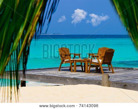 Cafe on the beach, ocean and sky - vacations background