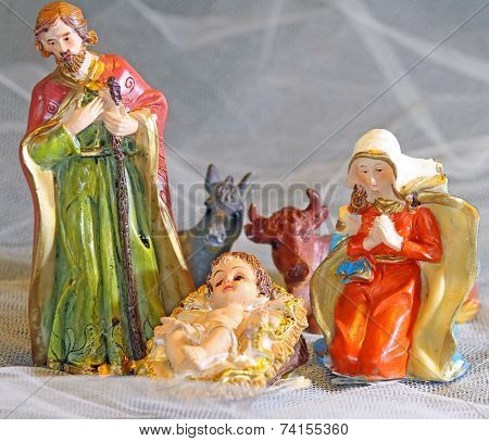 Holy Family In The Tradition Of Christmas With Doneky And Ox