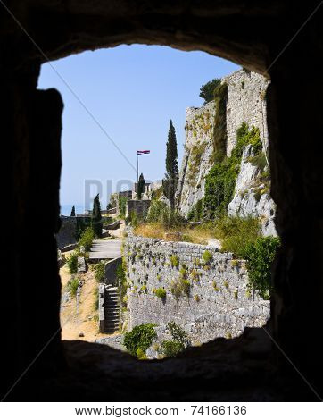 Window at old fort in Klis, Croatia - architecture background