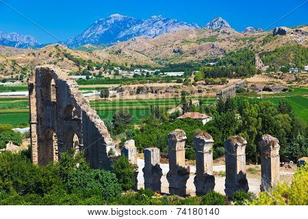 Aqueduct at Aspendos in Antalya, Turkey - archaeology background