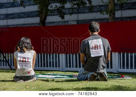 Two Young People At View Section Of Aids Quilt