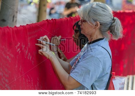 Wrtiting On Memorial Aids Ribbon