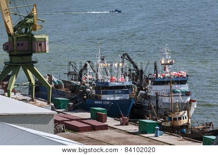View of Petropavlovsk-Kamchatsky port and ships crabber at the pier