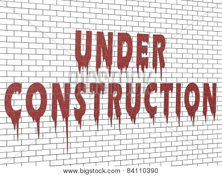 Under Construction - Inscription On A Brick Wall With Oil Paint Streaks