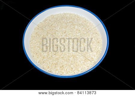 Bowl of uncooked Rice