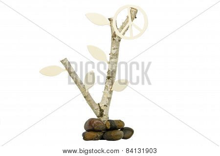 Birchwood with wooden symbol for peace