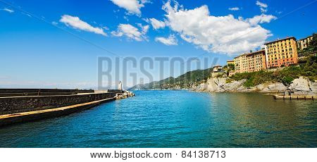 Camogli Marina Harbor Entrance And Lighthouse. Ligury, Italy