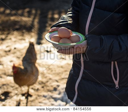 Pretty Girl Holding  Organic Eggs