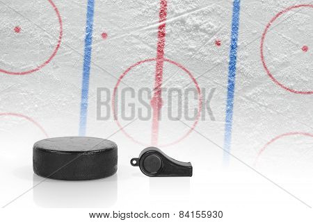 Referee Whistle, The Puck And Hockey Field