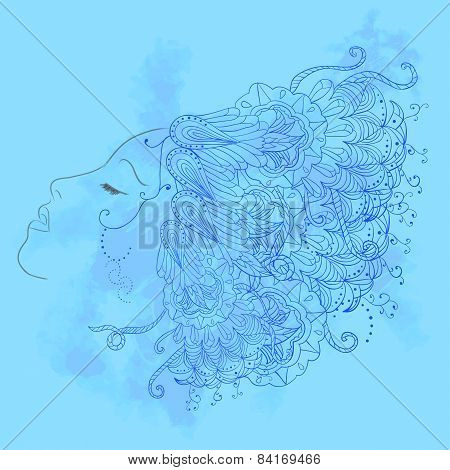 silhouette of a woman's face with ethnic ornament