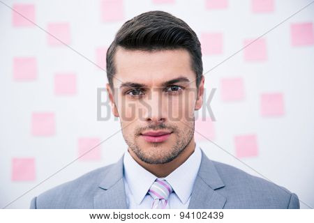 Portrait of a handsome businessman looking at camera 