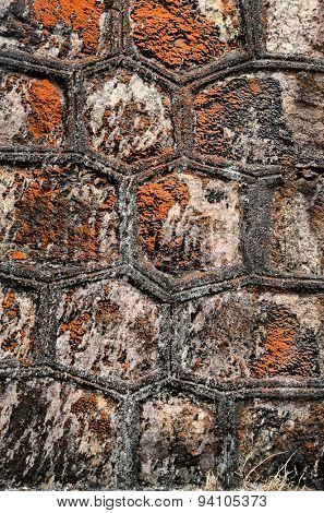 Texture of a stone wall of abandoned christian church on top of Bokor mountain in Preah Monivong national park, Kampot, Cambodia