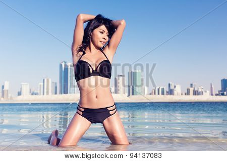 Sexy tourist girl in Dubai city beach
