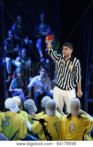 ST. PETERSBURG, RUSSIA - JUNE 19, 2015: Football player Alexander Kerzhakov performs in a scene from a children's charity project titled Mowgli Generation. The performance is part of the SPIEF 2015