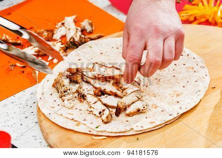 chef making tortilla