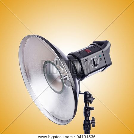 Studio light stand against the gradient