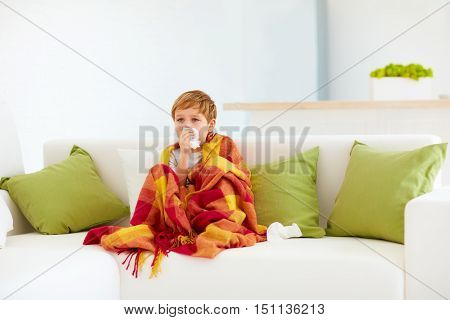 Sad Kid Watching Tv At Home With Napkins