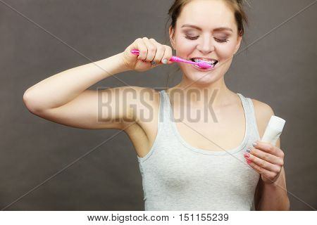 Woman Brushing Cleaning Teeth