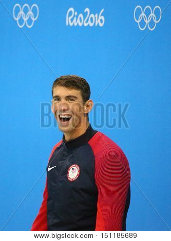 RIO DE JANEIRO, BRAZIL - AUGUST 12, 2016: Michael Phelps of United States during medal ceremony after Men's 100m butterfly of the Rio 2016 Olympics at the Olympic Aquatics Stadium