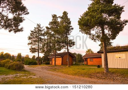 wooden cottages at a campground in norway