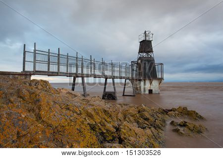 Battery Point Lighthouse Portishead Great Britain. Vintage lighthouse at sunset.
