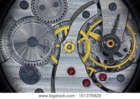 Old soviet pocket watch inside mechanism with wheels springs and rubies