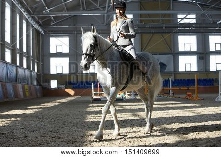 Woman in manege