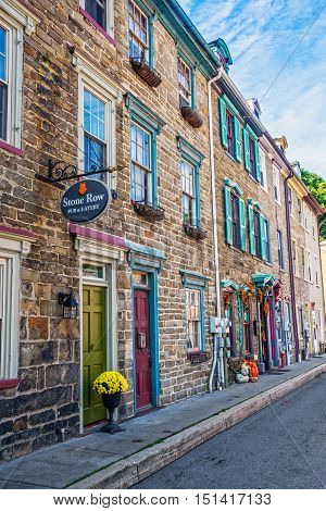 JIM THORPE PENNSYLVANIA - SEPTEMBER 28: Historic row homes with shops on Race St. on September 28 2016 in Jim Thorpe Pennsylvania.