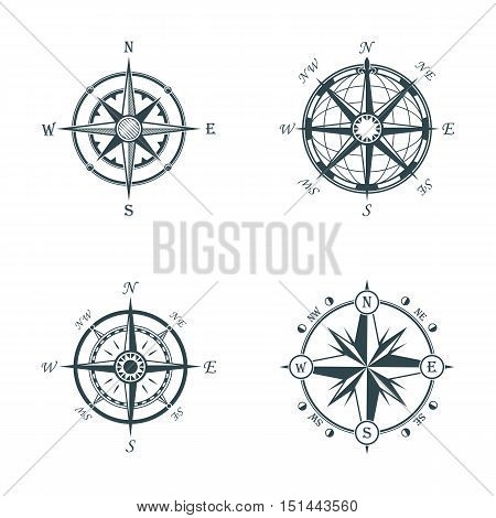 Set of vintage or old different style like globe and arrows compasses for west and east, north and south navigation. Perfect for marine and nautical, ship and topography, maritime theme