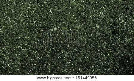 Asphalt, asphalt texture, scabrous asphalt background, asphalt pattern, abstract background, abstract texture, coloured dark asphalt texture, green abstraction, grunge texture