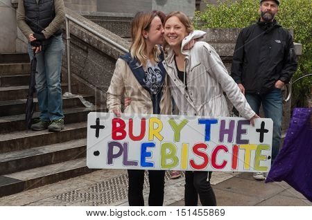 ADELAIDE, AU - SEPTEMBER 4, 2016: South Australians supporters of marriage equality gather outside Parliament House to express opposition to the Australian Federal Government's plan for the 2017 plebiscite.