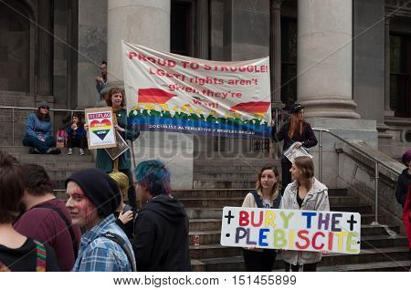 ADELAIDE, AU - SEPTEMBER 4, 2016: South Australians supporters of marriage equality gather outside Parliament House to express opposition to the Australian Federal Government's plan for the 2017 plebiscite.