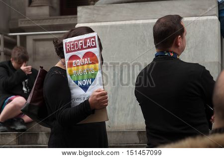 ADELAIDE, AU - SEPTEMBER 4, 2016: South Australians supporters of marriage equality gather outside Parliament House to express opposition to the Australian Federal Government's plan for the 2017 plebiscite.