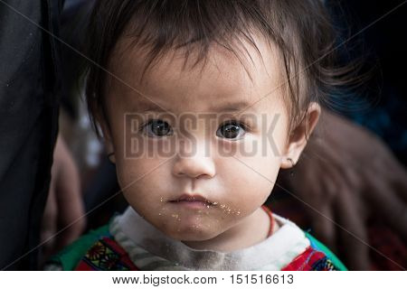 Sapa, Vietnam-September 2016: The innocence of Munk kid in Sapa, Vietnam. Kids in Sapa live in prverty and lacks of healthcare.