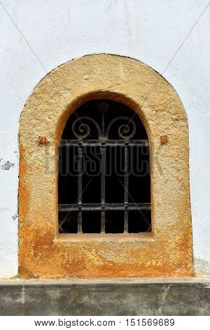 Forged Metal Lattice On Cellar Window