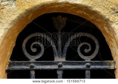 Forged Metal Lattice On Cellar Window