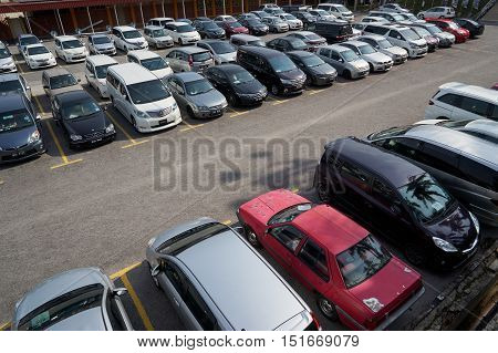 Kuala Lumpur MALAYSIA - 09 OCTOBER : Rows of the number of cars parked in a public parking lots in the holidays. Wilayah Persekutuan Kuala Lumpur 2016 .