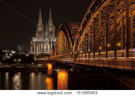 Illuminated bridge in Cologne at night, Germany
