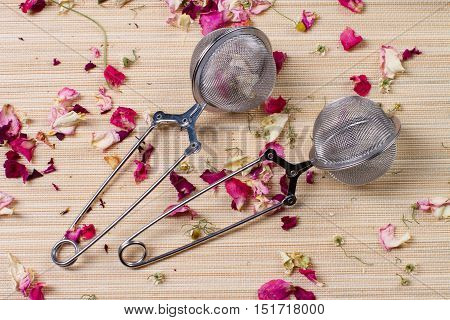 Aromatic dry roses tea with tea strainer