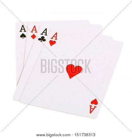 Four aces from a deck of cards with the ace of hearts on top isolated on white background.