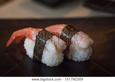 Close up of delicious japanese food call nigiri sushi made from sweet shrimp seaweed and japanese rice in local sushi food kanazawa japan.