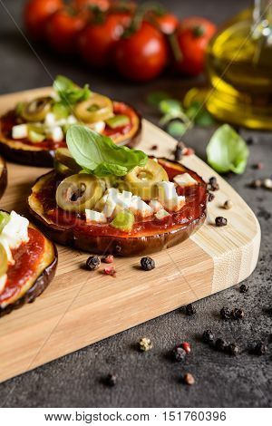 Eggplant Pizzas With Tomato Sauce, Cheese, Pepper And Olives