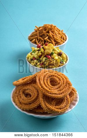Indian Snack : Chakli, chakali or Murukku and Besan (Gram flour) Sev and chivada or chiwada. Diwali Food