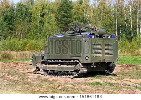 Unmanned ground combat vehicle for remote-controlled demining